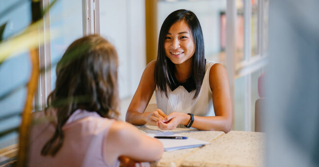 Portrait,Of,A,Young,,Asian,Chinese,Woman,In,A,Meeting