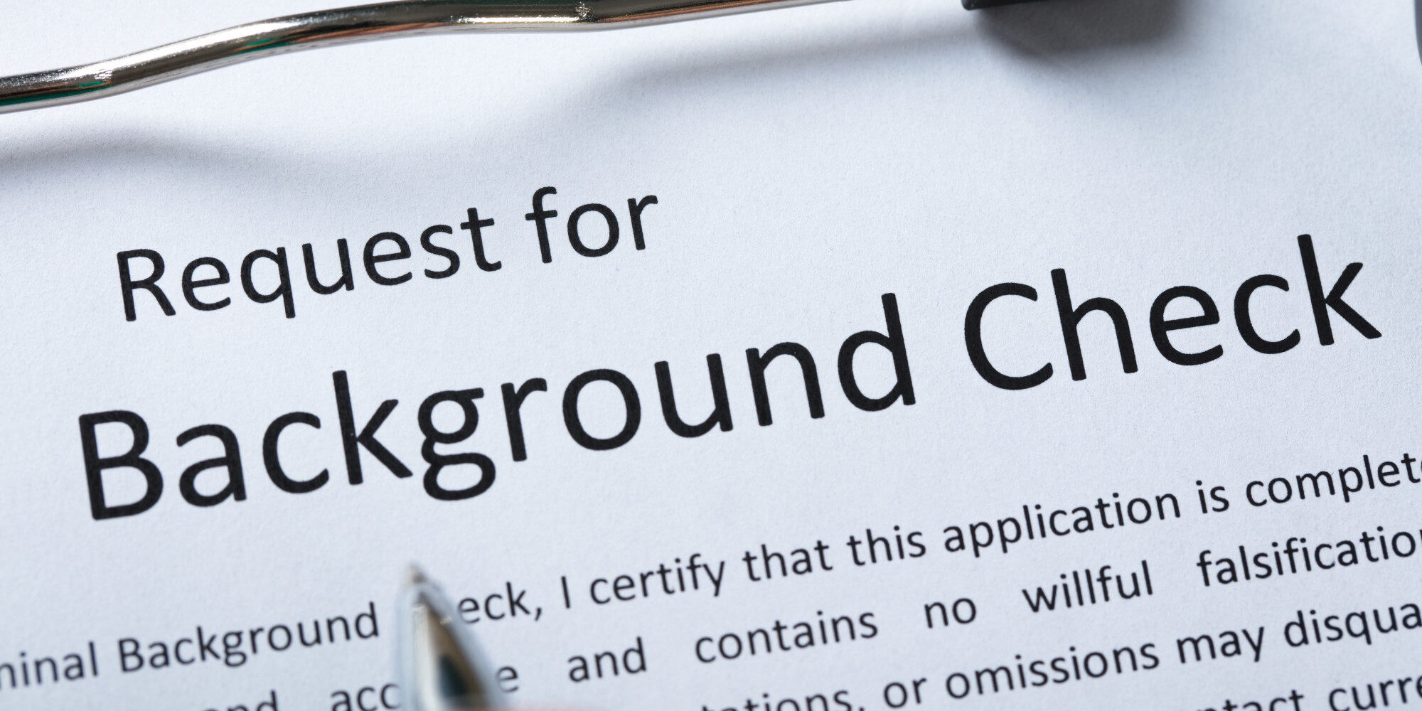 Criminal Background Check Application Form With Pen